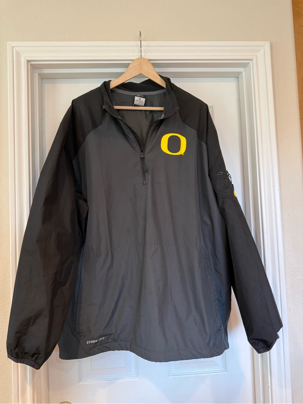 Nike Storm-Fit Men's Black & Gray Windbreaker with Yellow 'O' Logo